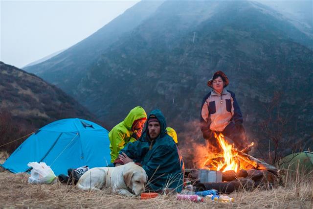 Overnight in tents near a fire