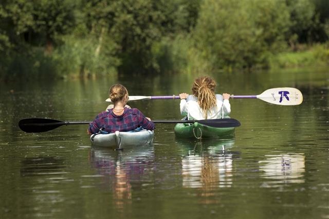 Two Girls In Canoe