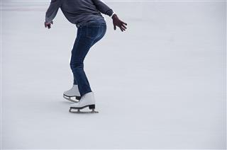 Girl Skating On Ice