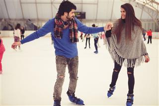Couple On Skating Rink