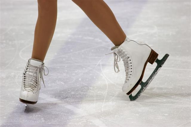 Close Up Of Figure Skaters Feet