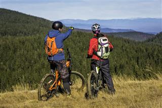 Mountain Bikers On Top Of Hil