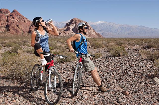 Mountain Biker Couple Taking A Break