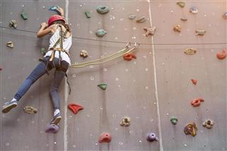Teenage Girl In A Free Climbing Wall