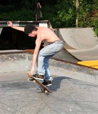 Skateboarder Landing Trick