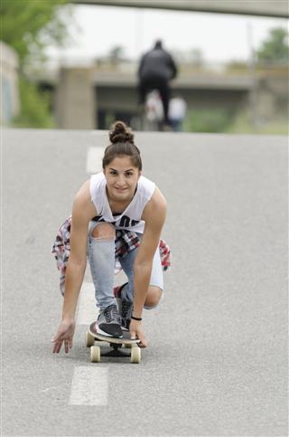 woman driving skateboard