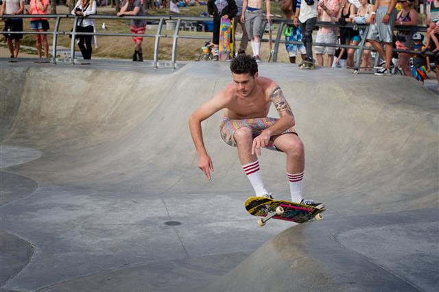 Skateboarder Performing An Ollie