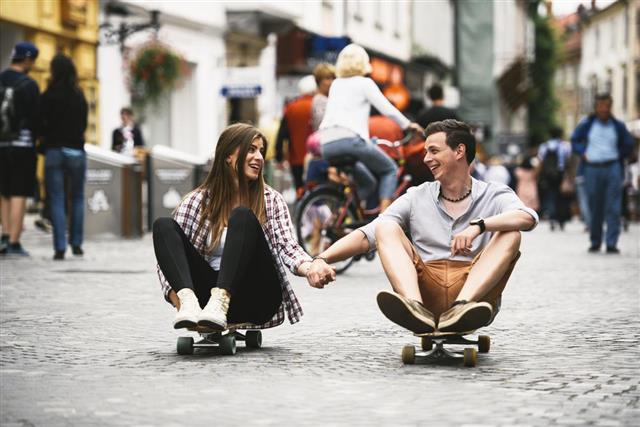 Couple with Longboards