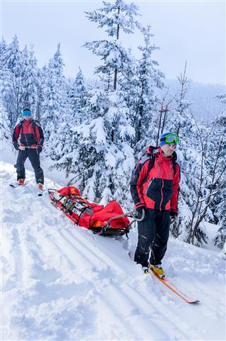 Ski Patrol Transporting Injured Skier