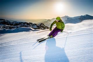 Woman Skiing Downhill