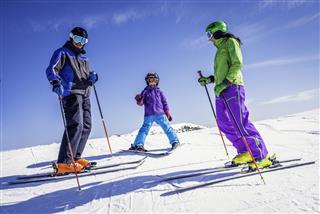 Family On Ski Slope