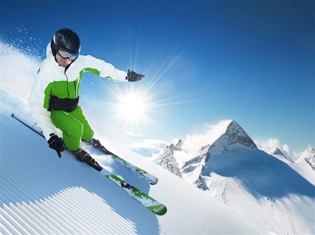 Skier Going Down A Slope