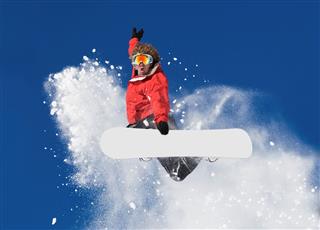 Snowboard Jumping In Colorado