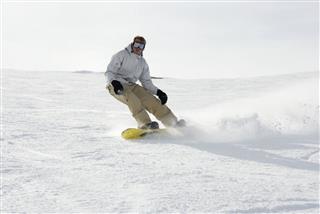 Snowboarding In Powder Snow