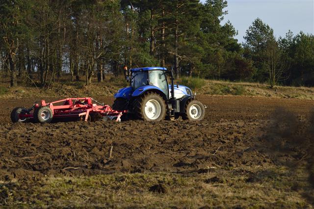 Ploughing In The Field