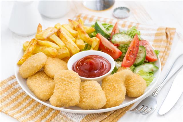 Chicken Nuggets French Fries And Vegetable
