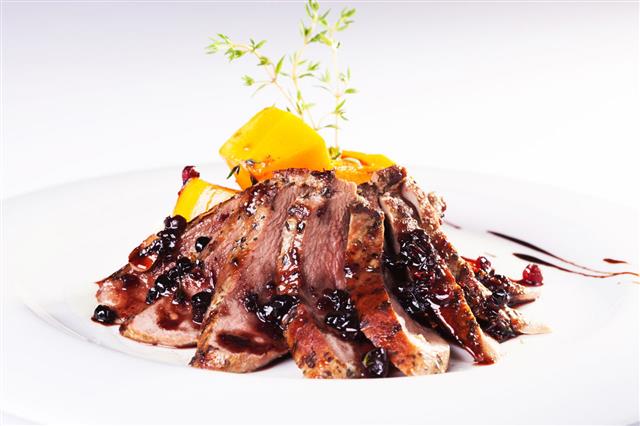 Grilled Veal Meat With Cranberry Sauce