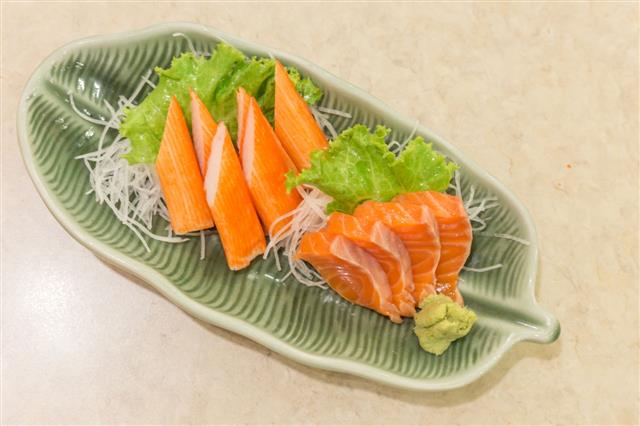 Salmon Sashimi And Crab On Leaf Dish