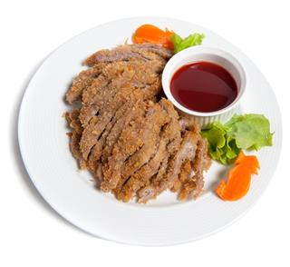 Battered Pork With Sauce On A Plate
