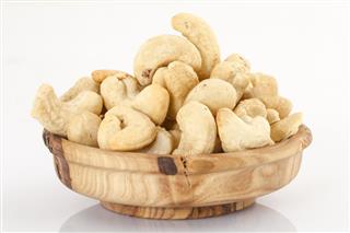 Roasted Cashew Nuts In Wooden Bowl