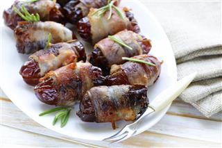 Dates Wrapped In Bacon And Fried
