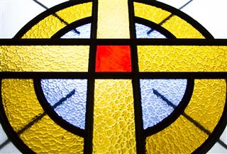 Cross In A Stained Glass Window