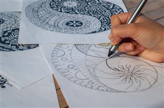 Woman Drawing Yin Yang