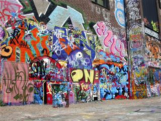 Graffiti Wall With Many Colored Murals