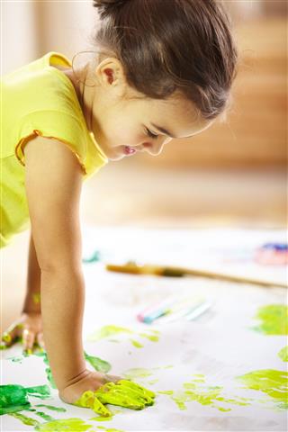 Girl Doing Finger Painting