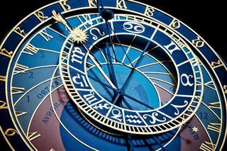 Astrological signs on clock