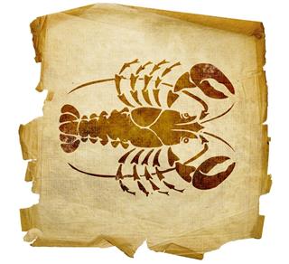 Crab cancer zodiac sign on paper