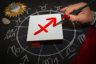 Female Astrologer Draws Sagittarius Zodiac Sign