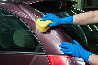 Washing Car With Sponge