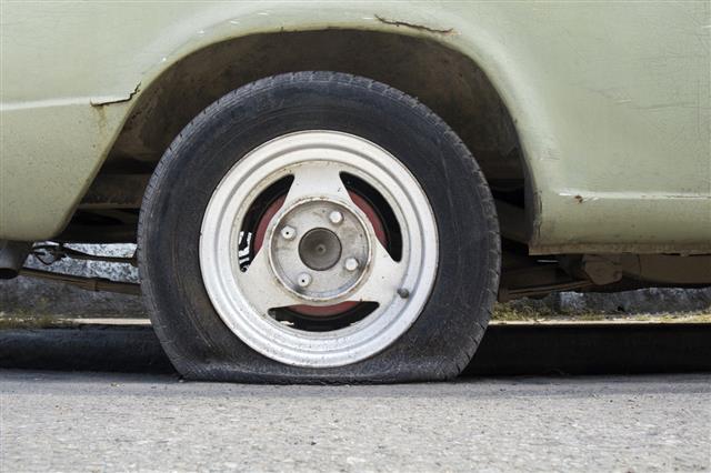 Flat Tire Of Old Car