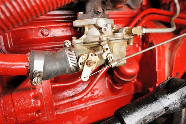 Carburetor On Old Red Antique Tractor