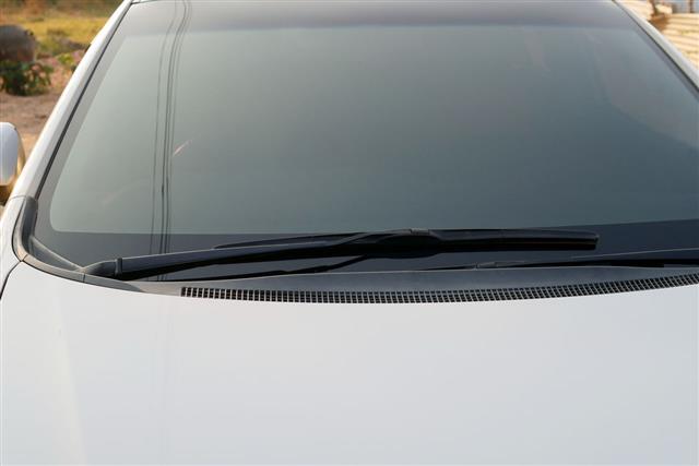 Windshield Wipers Of A White Car