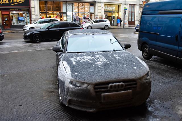 Frozen Audi Car After Snowfall