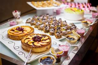 Cakes and pastries on buffet table