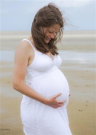 Pregnant Woman on the Beach