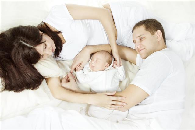 Young family with newborn baby