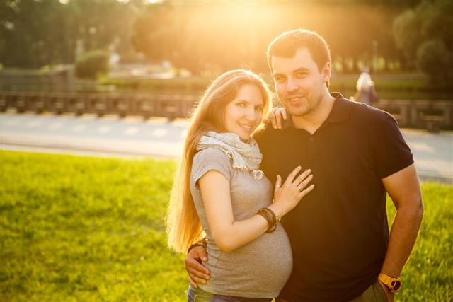 Portrait of Happy Young Couple Expecting Baby