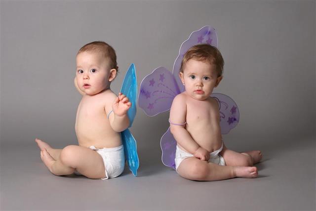 Twins with butterfly wings
