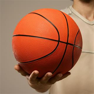 Basketball In A Persons Hand
