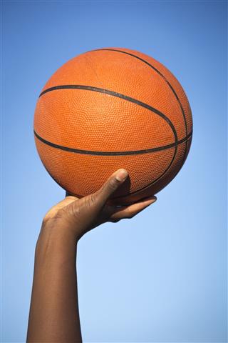 Holding Basketball In The Air