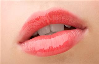 Womans Lips With Lip Gloss