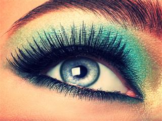 Womans Eye With Green Make Up