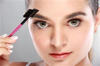 Model Using Eyebrow Brush