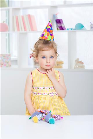 Little Girl In A Festive Hat