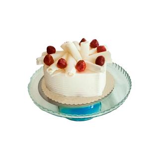Delicious strawberry cake with white chocolate on a white background