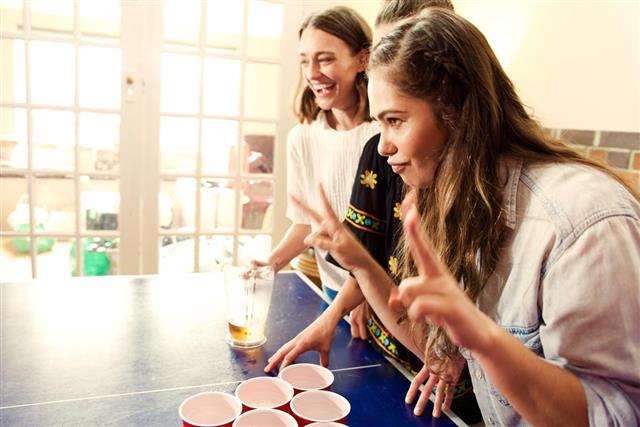 Playing Beer pong